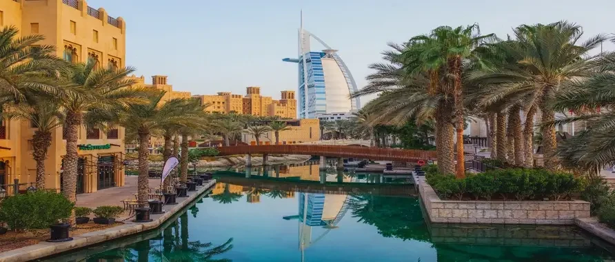A view of the Mall of the Emirates in Dubai, featuring its distinctive design and bustling retail environment.