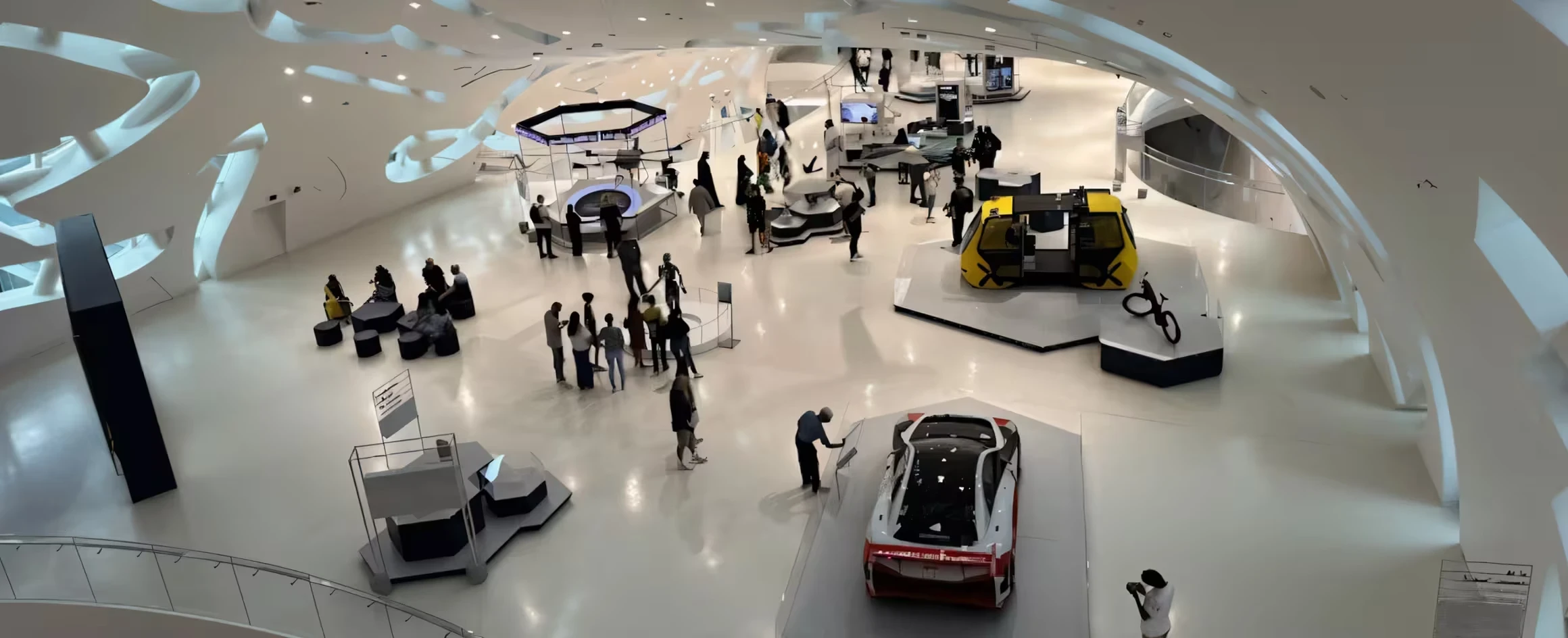 Visitors exploring innovation exhibits inside the Museum of the Future