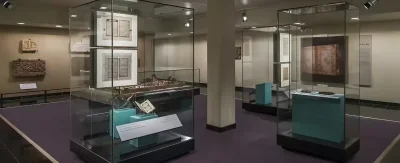 Glass display of Islamic heritage books at Sharjah Museum