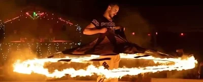 Magician performing at night show in Dubai desert safari camp