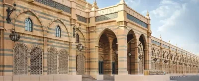 Tourist capturing the museum's interior on private Sharjah city tour